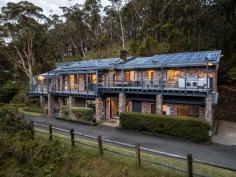 169 Otford Road Otford NSW 2508 This picturesque leafy retreat seems a world away, but is conveniently situated only an hour from Sydney CBD. Escape the stresses and pressures of city living and spend your time surrounded by nature, including trees, birds and pristine beaches. Combining luxurious living with serene natural surroundings, this is the ultimate oasis for relaxation and entertaining. YOUR HOME • Feel an immediate sense of serenity as you arrive at your oasis, nestled on a peaceful five-acre property. The home has been designed to embrace the natural surroundings with high raked ceilings, expansive timber decks, open fireplaces as well as breathtaking views which are showcased from most rooms. • Featuring four generously proportioned bedrooms, including a master suite with a generous study, walk-in robe, modern ensuite, and serene bushland views. • The heart of the home is the large open living area flowing onto the kitchen and sundrenched decks beyond. This is sure to be the backdrop for many happy family memories. • The lower level of the home comprises a spacious rumpus room complete with fireplace, additional bedroom/study bathroom and laundry. Perfect for those wanting more space for children, guests or hobbies. • Only steps from the backdoor of the home, you will discover a magnificent in-ground pool surrounded by a spacious paved terrace and self-contained pool house. This versatile and compact residence boasts a kitchen, bathroom, living room, and a covered alfresco dining area. • A dedicated laundry room with outdoor access adds convenience, while ample storage solutions throughout the home enhance practicality. • The landscaped grounds offer space for vegetable gardens, fruit trees, or further landscaping to suit your vision. • A large machinery shed and workshop provide endless possibilities, with potential for conversion into stables, additional garaging, or even a creative studio. • With a long driveway taking you away from the street and a secure gate, your privacy and security are assured, while ample parking accommodates up to six vehicles, including boats and campervans. YOUR LIFESTYLE • Wake up each morning to the sound of the local birdlife and sunlight streaming through the surrounding native trees. • Easy walk to the train station and local primary school. • 5 minutes South is the pristine Stanwell Park Beach and 5 minutes North is the entry to the Royal National Park. If you appreciate spending time with your family outdoors, this is the perfect location. • Embrace coastal living with swimming, fishing, bushwalking, hang gliding and picnics in popular parklands all available only moments from your doorstep. • Otford offers a tranquil lifestyle with easy access to Sydney (1 hour), Wollongong (25 minutes) and all that this gorgeous coastline has to offer. • Coastal acreages are highly sought after and becoming increasingly hard to find. Don't miss out as you never know when this opportunity may present itself again.
