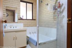 32 Frearson Street Castletown WA 6450 $545,000 This charming double-brick, 4 bedroom home has been lovingly cared for and is perfect for family living. It features a welcoming separate lounge room, a spacious family room, a kitchen/dining area and a large semi-enclosed patio that’s ideal for entertaining. The kitchen includes a walk-in pantry and the home is equipped with ceiling fans and a reverse cycle air conditioner for year-round comfort. Conveniently, there is a drive-through carport that leads to a garage/workshop, providing ample storage and workspace.