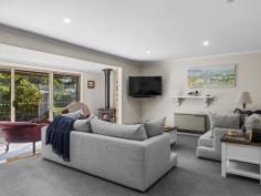 4 Box Ave Sandy Point VIC 3959 $860,000-$910,000 Nestled within approximately 1,075 square meters of lush, fully fenced gardens and designed to offer a seamless blend of indoor and outdoor living, this home is perfect for those seeking an escape from the hustle and bustle. Every room overlooks the enchanting garden, where mature trees create a natural canopy, inviting local birdlife and providing ample shade. Enjoy year-round alfresco entertaining under a covered BBQ area, ideal for gathering with friends or savouring peaceful moments in nature. The light-filled sunroom, complete with a cozy wood heater, flows into a welcoming living room. Well-appointed kitchen, featuring stainless steel appliances, generous storage, and a breakfast bar that connects to the practical tiled dining area. Three comfortable fitted bedrooms, the master with walk-in robe and private powder room. The central bathroom provides a touch of luxury with a spa bath and separate shower, the adjoining laundry grants access to roof storage for added convenience. Additional features include a versatile garage/workshop with wood heater, kitchenette, and an attached bathroom-perfect for hobbies, guest accommodation, or extra storage. Practical amenities include a woodshed, lockup storage shed, bore, and tank water. With ample parking for multiple vehicles, a boat, or jetski, this picturesque coastal haven is perfect for full-time living or carefree holiday escapes. Embrace a lifestyle where comfort, nature, and convenience come together in harmony.