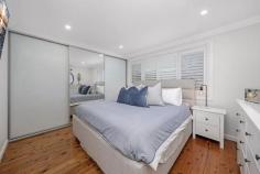86 Jacaranda Drive Georges Hall NSW 2198 Nestled at the end of a cul-de-sac, thoroughly renovated and surrounded by lush lawns, 86 Jacaranda Drive is an idyllic place to raise a family. Sprawling over one bright and elegant level, this welcoming brick home breezes from generous open-plan living, out to an enormous deck. With a full barbecue kitchen and dedicated alfresco lounge and dining zones, this media-equipped haven is an entertainer's delight. Meanwhile, children will discover a veritable wonderland between the enchanting cubby and vast yard. Despite its serene location, this 771m2 (approx.) property enjoys easy access to arterial roads and is a short stroll from shops, transport and dining at Bass Hill Plaza. It's also moments from beautiful: lakeside trails and playgrounds at Garrison Point. Property Features: 771m2 (approx.) in serene end-of cul-de-sac position Spacious open-plan living flows seamlessly outside via bi-fold doors and servery window Brand-new bathroom showcases large format travertine-look tiles, bath separate to shower and 2nd WC Expansive soft-close contemporary kitchen with Ilve gas cooktop and oven, dishwasher and stone breakfast bench Huge covered outdoor room includes alfresco kitchen, in-built speakers, TV inputs and all-weather blinds Vast manicured lawn, custom-built cubby house and raised produce gardens Rendered brick exterior; freshly painted inside and out Plantation shutters, polished original floorboards, built-ins and split-system air conditioning throughout LUG and laundry with internal access, plus abundant driveway parking and large storage shed Short stroll to Bass Hill Plaza and buses; moments to arterial roads, George's Hall Village cafes, parks and lakeside nature trails Located within proximity to great local schools, shops, cafes, parklands and public transport, this is an opportunity not to be missed. St Mary's Catholic Primary School - 1.4km Bass Hill Plaza - 1.1km The Crest Sporting Complex - 1.2km Bass High School - 1.5km Georges River Grammar - 1.5km Georges Hall Shops (Birdwood Road) - 1.5km Georges Hall Public School - 1.6km