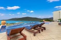 23 / 16 Golden Orchid Drive Airlie Beach QLD 4802 Step into a world of serenity and style with this immaculate Pinnacles apartment. Unit 23 enjoys one of the best spots in the complex, offering panoramic views of the Coral Sea and Whitsunday Islands that will take your breath away. Nestled in the heart of lively Airlie Beach, it's only a short stroll to the Main Street and the entrance to the Great Barrier Reef. This fully furnished two-bedroom, two-bathroom apartment is designed with spacious living and entertaining in mind. The expansive balcony, complete with an inbuilt spa, is perfect for unwinding or hosting guests, while resort-style amenities like a wet-edge pool, sauna, and gym are just moments away. Part of the holiday letting pool, this property offers the flexibility to enjoy your apartment whenever you like, while also generating income throughout the year. Features include: • Open-plan living, kitchen, and dining areas • Two spacious bedrooms with built-in wardrobes • Master bedroom with an ensuite for added privacy • Fully equipped kitchen with a dishwasher • Large balcony with built-in spa • Air-conditioning throughout for year-round comfort • Fully furnished with new furniture • Easy access from the car park to your door • Direct access to the pool and amenities from the front door • 1 undercover car park • 24-hour onsite management • Resort-style facilities • Just minutes' walk to Airlie Beach's Main Street Seize the opportunity to own your piece of Whitsundays paradise and make your dream lifestyle a reality today.