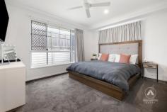 23 Arravanda Crescent Pallara QLD 4110 $1,049,000 Tucked away in a quiet, family-friendly street, this modern 4-bedroom masterpiece isn’t just a house-it’s been a sanctuary of love, laughter, and cherished moments for its current owners since it was built in 2021. From hosting movie nights in the soundproofed cinema room to Sunday morning coffees under the patio as the kids played in the backyard, every corner of this home has a story. Set on a generous 414m² block, this home was designed to blend sophisticated style with everyday functionality. From the moment you step through the front door, you can feel it: this is where comfort meets elegance. A Kitchen Made for Connection The heart of the home-an open-plan kitchen-has been the backdrop to countless family dinners and late-night chats. With 40mm Caesarstone benchtops, a walk in pantry for seamless organisation, and premium Westinghouse appliances, it’s a chef’s dream. The large window above the cooktop not only fills the space with natural light, but also offers a clear view of the backyard-perfect for watching the kids or keeping an eye on the pets. Entertainment, Elevated The fully soundproofed cinema room has been the go-to spot for weekend movie marathons and game day screenings. Complete with custom doors and the option to purchase the $10K Optoma projector, screen and surround sound setup, this space was built for unforgettable moments. Rest and Recharge in Style The master suite is a true retreat, featuring luxurious carpets underfoot, a spacious walk-in robe, and an ensuite that rivals any five-star hotel-complete with a double vanity and oversized rain shower. The additional bedrooms are equally impressive, offering ducted air conditioning, mirrored wardrobes, and plenty of space for children, guests, or even a home office. Modern Comforts, Thoughtfully Designed The main bathroom is both stylish and practical, with a handheld and rainforest shower head and built-in shower caddy, and a separate toilet for added convenience. Every element has been carefully considered. Outdoor Living, All Year Round Whether it’s a barbecue with friends or a quiet evening under the stars, the outdoor patio-with ceiling fan and ambient lighting-has seen it all. The private backyard is low-maintenance yet inviting, ideal for family fun or simply unwinding after a long day. Additional Features: High 2.7m ceilings for a spacious, airy feel dishwasher and retractable tap. Smart Air Touch ducted A/C system Double lock-up garage. Large Laundry with Ample Storage Quality wood-look vinyl flooring and plush top of the range charcoal carpets. Why They Loved It Here For the current owners, this home has been more than just four walls-it’s been the setting for milestones, growth, and treasured memories. Now, it’s ready for its next chapter. If you’re searching for a home that offers both luxury and lifestyle-where every feature has been designed with real living in mind-this is your opportunity.