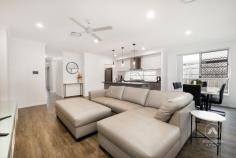 23 Arravanda Crescent Pallara QLD 4110 $1,049,000 Tucked away in a quiet, family-friendly street, this modern 4-bedroom masterpiece isn’t just a house-it’s been a sanctuary of love, laughter, and cherished moments for its current owners since it was built in 2021. From hosting movie nights in the soundproofed cinema room to Sunday morning coffees under the patio as the kids played in the backyard, every corner of this home has a story. Set on a generous 414m² block, this home was designed to blend sophisticated style with everyday functionality. From the moment you step through the front door, you can feel it: this is where comfort meets elegance. A Kitchen Made for Connection The heart of the home-an open-plan kitchen-has been the backdrop to countless family dinners and late-night chats. With 40mm Caesarstone benchtops, a walk in pantry for seamless organisation, and premium Westinghouse appliances, it’s a chef’s dream. The large window above the cooktop not only fills the space with natural light, but also offers a clear view of the backyard-perfect for watching the kids or keeping an eye on the pets. Entertainment, Elevated The fully soundproofed cinema room has been the go-to spot for weekend movie marathons and game day screenings. Complete with custom doors and the option to purchase the $10K Optoma projector, screen and surround sound setup, this space was built for unforgettable moments. Rest and Recharge in Style The master suite is a true retreat, featuring luxurious carpets underfoot, a spacious walk-in robe, and an ensuite that rivals any five-star hotel-complete with a double vanity and oversized rain shower. The additional bedrooms are equally impressive, offering ducted air conditioning, mirrored wardrobes, and plenty of space for children, guests, or even a home office. Modern Comforts, Thoughtfully Designed The main bathroom is both stylish and practical, with a handheld and rainforest shower head and built-in shower caddy, and a separate toilet for added convenience. Every element has been carefully considered. Outdoor Living, All Year Round Whether it’s a barbecue with friends or a quiet evening under the stars, the outdoor patio-with ceiling fan and ambient lighting-has seen it all. The private backyard is low-maintenance yet inviting, ideal for family fun or simply unwinding after a long day. Additional Features: High 2.7m ceilings for a spacious, airy feel dishwasher and retractable tap. Smart Air Touch ducted A/C system Double lock-up garage. Large Laundry with Ample Storage Quality wood-look vinyl flooring and plush top of the range charcoal carpets. Why They Loved It Here For the current owners, this home has been more than just four walls-it’s been the setting for milestones, growth, and treasured memories. Now, it’s ready for its next chapter. If you’re searching for a home that offers both luxury and lifestyle-where every feature has been designed with real living in mind-this is your opportunity.