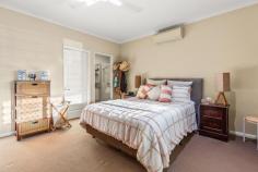 4 Jiimany Way Cable Beach WA 6726 $799,000 Have you been searching for the perfect investment opportunity? One that delivers a real return on your hard-earned investment? Look no further. Tucked away in a popular Cable Beach estate, this modern, spacious 4 bed, 2 bath home will give all that and more! Perfect for savvy investors or homeowners in no hurry to move, the home is corporately tenanted until April 2026, bringing in a cool $1350 in rental return each and every week. The ROI on this property alone is enough to attract many a buyer but wait until you've seen the home. From the front, the home boasts lush tropical gardens with mature towering trees for added peace and privacy. The large double carport has room for two big vehicles, with plenty of additional parking space and a lockable rear storeroom for added storage options. Modern, flexible and feature-packed, with quality finishes throughout, the home blends space and style with open-plan living and dining with wood laminate flooring, a neutral colour palette and an abundance of natural light. The modern open kitchen is sure to impress with white gloss cabinetry, stone countertops, stainless steel Chef's oven, built-in pantry and big island breakfast bar. The stunning home even includes the large second living area which could be utilized as a home theatre or even a 5th bedroom, plus a large main bathroom with separate shower and bath, separate laundry with built-in cabinetry, air-conditioning, ceiling fans, window blinds, security screens and more! The rear bedroom zone is perfect for the kids with 3 large bedrooms, all with built-in robes and air-con, around the central main bathroom. Parents will love the peace and privacy of the large front Master, complete with a walk-in robe and private ensuite. Designed to maximise Broome's outdoor lifestyle, raised timber decks front and back, both with ceiling fans, offer plenty of entertaining space, with the expansive entertaining deck overlooking established tropical gardens with plenty of grass for the kids and pets to play. Located just a short walk through Minyirr Park onto the golden sands of Cable Beach, and close to local primary schools, shops and Cable Beach's famous restaurants and bar precinct, the prime location only adds to this property's glowing appeal.