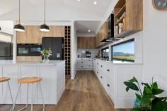 8 Moyne View Little Hartley NSW 2790 $1,450,000 - $1,550,000 This impressive architecturally designed home, completed in 2023, catches your eye from the moment of arrival. Affording an elevated perspective, with Blue Mountain escarpment views and rolling farmland outlooks, this is a home that offers a break from the bustle of city life. It is a haven of light, space and versatility with its contemporary dual-wing design. With a choice of relaxation zones and four bedrooms this home offers flexible functionality. Expansive alfresco entertaining and an enormous 4 car workshop add to this home's modern appeal which is found less than a 2 hour drive from Sydney. This is a chance to live the country lifestyle without compromising on your contemporary checklist. Breakdown of Features: Perfect single level flow with central wide entry giving way to dual wing floorplan Auto double garage with internal access; expansive 4 car workshop with separate driveway Multiple sliding doors offering seamless migration to alfresco entertaining Vast open plan living, dining and kitchen with hidden butlers pantry Ducted air conditioning throughout plus slow combustion real wood fire in main living Master bedroom with walk-through robe and luxurious full bathrooms with deep bath All bedrooms with optimal wardrobe storage, natural light and relaxing garden views Fully insulated; double glazed; cross-ventilation; 3-phase power and solar panels Reliable NBN Fixed Wireless; within catchment of Mt Vic Public School & Lithgow High Less than a 20 min drive to Blackheath and Lithgow; Less than 2 hours from Sydney Airport