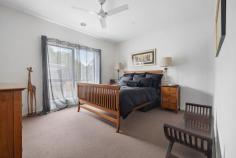 1/428 McClelland Drive Langwarrin VIC 3910 $699,000 - $749,000 Stacked with high-end finishes, clever storage, and a layout that just makes sense, this modern 3-bedroom townhouse delivers a home that's sleek, stylish, and straight-up effortless. A smart and effortless design that works for living easily has been crafted for maximum flow between indoors and out, ready for lively entertaining, kicking back, or just living your best life. Its open-plan living and dining zone is finished with large-format tiles and equally impressive natural light, filtering golden rays inside while peering out over its covered terrace and yard. The kitchen is a showstopper with warming tones and sleek stone benchtops surrounding stainless steel appliances, stepping outside to a private covered patio ready for morning coffees, sunset drinks, or lazing away. Three generous bedrooms include a downstairs master with a full ensuite and walk-through robe, with individual split-system comforts, a central bathroom and a separate toilet serving the upper level. Comfort is covered year-round with central heating and split-system air conditioning, while the remote double garage stores the wheels. Its location is near-unbeatable, just minutes from Karingal Hub, Mornington Peninsula Freeway, Karingal Heights Primary, McClelland College, and public transport, putting everything you need right at your fingertips. Whether you're a first-home buyer, a savvy investor, or looking to downsize without compromise, this one ticks every single box.