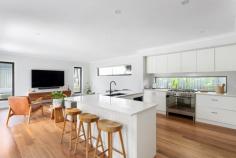 3 Mclerie Street Helensburgh NSW 2508 This very generously proportioned home offers plenty of space for the whole family. It is ideally positioned close to parks, the local duck pond and a picturesque walkway leading you straight into the heart of town. YOUR HOME • Designed with an open-plan layout, this home offers a bright and airy ambiance while ensuring a practical space for families of all sizes. • The expansive living area flows effortlessly onto the covered entertaining deck, swimming pool, and manicured backyard-perfect for summer evenings spent around the BBQ while the kids splash in the pool. • The stylish kitchen is a dream for any home cook, featuring a spacious island bench, premium appliances, and a walk-in pantry for added storage and functionality. • Stay comfortable year-round with reverse cycle air-conditioning, keeping the home warm in winter and cool during the warmer months. • Bathed in natural sunlight, the level, fully fenced backyard provides a secure and spacious haven for children and pets to enjoy. • The master suite is a standout, offering ample space, a deluxe en-suite, and a walk-in robe, while three additional bedrooms come complete with built-in storage. • A double garage with internal access provides secure parking along with extra storage for equipment and recreational gear. • Finished to the highest standard, this home is move-in ready-simply unpack and start embracing your luxurious new lifestyle. LOCATION • Positioned in a convenient location in the heart of Helensburgh close to all amenities. Within a short stroll you can find restaurants, cafes, parks, supermarket, free public pool and much more. • Helensburgh train station only a few minutes drive from your front door and bus stops just a moment's walk, fantastic for those commuting on public transport. • Immerse yourself in nature with the Royal National Park and Stanwell Park Beach nearby. • Helensburgh is located approximately 1 hour South of Sydney CBD and approximately 30 minutes North of Wollongong CBD. • Embrace the quintessential coastal lifestyle and all that comes with it... swimming, fishing, bushwalking, hang gliding and family picnics in popular parklands all available only moments from your doorstep.
