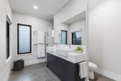 4 Wally Street Nundah QLD 4012 Built in 2019 with the balance of a new build warranty transferable to new owners, this lifestyle friendly home has been designed for large family living. High 2.7m ceilings, light airy rooms and premier finishes combine in this quality built family home located moments from parkland, schools and Nundah Village. Just 8.5kms from Brisbane CBD, 4 Wally Street is Nundah's best kept secret and will prove popular. With space for every family member, the home offers 5 beautiful bedrooms, 3 luxuriously appointed bathrooms and multiple living spaces over each level. A media room and home office cater for modern family lifestyles. Ducted air conditioning and ceiling fans, a sleek entertainers kitchen with butlers pantry and extensive storage respond to large family living perfectly. At the rear, a sunny entertaining terrace and resort style, heated pool is perfect for casual family meals and quiet, Sunday morning coffee. Easily supervised from office or kitchen, the children's garden at the rear is low maintenance, secure and family friendly. Features: • Multiple living spaces over two levels • Kitchen with stone benchtop, dishwasher, 900mm freestanding gas cooktop & electric oven, Butlers pantry • Spacious open plan kitchen, living & dining • Covered entertaining terrace with retractable shade blinds • 5 bedrooms with built-in robes including guest room on lower level • Main bedroom with walk-in robe & ensuite • 2 additional bathrooms spread over each level of the home • Media room & home office • Solar heated pool 2.5 x7.5m • Inground trampoline and monkey bars • Large family-sized laundry with extensive cabinetry • My Air ducted air conditioning & ceiling fans • Security/insect screens • Double garage with auto driveway gate & garage door • Low maintenance gardens features mature fruit trees • Attic storage plus bike & garden sheds • Students study nook on each level • Extensive storage throughout • Gas hot water system & external gas point for barbecue • Solar System - 6.615kw - 21 solar panels • Built in 2019 with balance of new build warranty transferable in sale • Builder - Stroud Homes - 271m2 internal floor plan • Northgate State School & Aviation State High School catchments • Quality childcare centres & a range of private schools • Nundah Village Woolworths, shops, bars, restaurants & services • SkyGate 24 Hour Woolworths & shopping centre • Local cafes, gyms & sporting clubs • Parks & playgrounds, walking tracks & bikeways • Northgate & Nundah rail stations with bus services in Nellie St • M7 Airport Link tunnel providing easy access to CBD • Brisbane airports & M1 arterial road • 8.5 Km to Brisbane CBD • Fully fenced 382m2 Walk or cycle through hectares of nearby parkland or enjoy dinner with friends in Nundah Village. Take it easy & leave the car at home with local rail and bus services offering fast commutes to the CBD & throughout Brisbane. With cafes, eateries, bars and Sunday Farmers Market in this vibrant community, Nundah Village is casual Brisbane living at its best.