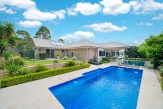 30 Saratoga Avenue Corlette NSW 2315 Flooded with an abundant of natural light, let me welcome you to 30 Saratoga Avenue in Corlette, an expansive 4 bedroom home and the blueprint for exceptional contemporary living. With commanding street presence and ultra-wide frontage, this vast family home embraces an incredible sense of scale. Take the lift up to the upper level, where high ceilings, modern downlights and polished timber floor boards accentuates a spacious ambiance with a statement fireplace. An abundance of glass sliding doors and window panes allow for a raft of natural light to drift throughout the interiors. Allowing an effortless transition between the indoors and outdoors, the living spaces have been cleverly constructed beside the outdoor covered entertaining area, to ensure hosting is effortless. Tailor-made for a growing family, the home has a host of multiple indoor and outdoor spaces to be enjoyed all-year round. Featuring: - Beautifully curated grounds with an amazing 9m heated mineral swimming pool, framed by green hedges - Solar panels - Open plan living, kitchen and dining areas - Ducted air conditioning and ceiling fans throughout - Beautifully constructed gas fireplace - Modern kitchen with stainless steel appliances, gas cooking and island bench bar - The master suite is fully carpeted and has a walk in wardrobe, ensuite (with 2 showers) and private sliding door exit to the rear backyard - 4 oversized bedrooms with 2.5 bathrooms - Movie theatre room or rumpus/optional 5th bedroom - Double lock up garage, plus additional space to park a car - Backing onto the lush native reserve - Fibre to the house allowing high speed internet - Work shop with mezzanine - 6kw Tesla EV charger - Lawn irrigation system keeping the grass and gardens in A1 condition - Plus, many other features which will be included in our information package Situated an approx. 2 minute drive to Salamander Bay Shopping Centre, an approx. 4 minute drive to Dutchman's Beach and Bagnall's Beach, experience the ultimate family lifestyle today.
