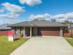 14 Dale Crescent Armidale NSW 2350 $500,000 - $550,000 Modern and low-maintenance, this four-bedroom home is an ideal investment opportunity, currently tenanted and beautifully presented. Each bedroom is equipped with built-in wardrobes, while the master suite boasts a walk-in robe and private ensuite. The heart of the home is the open-plan living and kitchen area, featuring light floating floors, reverse cycle air conditioning, and a kitchen with an island bench, two ovens and corner pantry for added convenience. The main bathroom offers a contemporary design, complete with a floating vanity, dark tiling, a deep bathtub, a shower, and a separate toilet. The property also includes a double lock-up garage with internal access, along with a neat, easy-care backyard. The outdoor space is enhanced by a garden shed and an undercover entertaining area—perfect for relaxing or hosting guests. A well-rounded property ready for investors seeking style and comfort in a sought-after location.