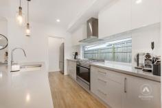 23 Arravanda Crescent Pallara QLD 4110 $1,049,000 Tucked away in a quiet, family-friendly street, this modern 4-bedroom masterpiece isn’t just a house-it’s been a sanctuary of love, laughter, and cherished moments for its current owners since it was built in 2021. From hosting movie nights in the soundproofed cinema room to Sunday morning coffees under the patio as the kids played in the backyard, every corner of this home has a story. Set on a generous 414m² block, this home was designed to blend sophisticated style with everyday functionality. From the moment you step through the front door, you can feel it: this is where comfort meets elegance. A Kitchen Made for Connection The heart of the home-an open-plan kitchen-has been the backdrop to countless family dinners and late-night chats. With 40mm Caesarstone benchtops, a walk in pantry for seamless organisation, and premium Westinghouse appliances, it’s a chef’s dream. The large window above the cooktop not only fills the space with natural light, but also offers a clear view of the backyard-perfect for watching the kids or keeping an eye on the pets. Entertainment, Elevated The fully soundproofed cinema room has been the go-to spot for weekend movie marathons and game day screenings. Complete with custom doors and the option to purchase the $10K Optoma projector, screen and surround sound setup, this space was built for unforgettable moments. Rest and Recharge in Style The master suite is a true retreat, featuring luxurious carpets underfoot, a spacious walk-in robe, and an ensuite that rivals any five-star hotel-complete with a double vanity and oversized rain shower. The additional bedrooms are equally impressive, offering ducted air conditioning, mirrored wardrobes, and plenty of space for children, guests, or even a home office. Modern Comforts, Thoughtfully Designed The main bathroom is both stylish and practical, with a handheld and rainforest shower head and built-in shower caddy, and a separate toilet for added convenience. Every element has been carefully considered. Outdoor Living, All Year Round Whether it’s a barbecue with friends or a quiet evening under the stars, the outdoor patio-with ceiling fan and ambient lighting-has seen it all. The private backyard is low-maintenance yet inviting, ideal for family fun or simply unwinding after a long day. Additional Features: High 2.7m ceilings for a spacious, airy feel dishwasher and retractable tap. Smart Air Touch ducted A/C system Double lock-up garage. Large Laundry with Ample Storage Quality wood-look vinyl flooring and plush top of the range charcoal carpets. Why They Loved It Here For the current owners, this home has been more than just four walls-it’s been the setting for milestones, growth, and treasured memories. Now, it’s ready for its next chapter. If you’re searching for a home that offers both luxury and lifestyle-where every feature has been designed with real living in mind-this is your opportunity.