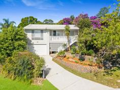 14 Elizabeth St Wyoming NSW 2250 Instant street appeal, beautifully renovated interiors, a lush leafy outlook, and dream al fresco entertaining spaces – this captivating property has it all! Perfectly positioned in a tranquil, tree-lined street within one of Wyoming’s most sought-after neighbourhoods, it’s a fantastic opportunity for families looking to settle in or investors seeking a move-in-ready home with strong rental appeal. Light-filled and stylish, this home has been thoughtfully updated to enhance comfort and functionality. A modern kitchen and stunning bathroom blend contemporary finishes with practical design, while the expansive wraparound deck and fully fenced backyard provide the ultimate setting for kids, pets, and entertaining. Features include: – Three bedrooms, all with ceiling fans; two with large built-in robes. – Stunning family bathroom featuring floor-to-ceiling tiles, a rain head shower, a floating double vanity, and a second WC. – Spacious living areas, including a lounge room with an office nook, plus an open-plan kitchen and dining flowing out to the deck. – Entertainer’s dream deck, offering ample space for outdoor dining and lounging, overlooking the private backyard. – Modern kitchen with an abundance of soft-close cabinetry, a corner pantry, Euromaid appliances (dishwasher, oven, and electric cooktop), a built-in breakfast bar, and a window splashback overlooking the backyard. – Two split-system air conditioning units in the living areas and ceiling fans in all bedrooms for year-round comfort. – Fully fenced backyard, tiered with level grassy areas – perfect for kids and pets. – Established gardens with lush greenery, including tibouchina, hibiscus, lilly pilly, camellia, citrus, and more. – Oversized single lock-up garage. There’s so much to love about this incredible home! Plus, this coveted location offers easy access to all the conveniences of Wyoming (local schools, shops and public transport), Gosford (CBD, waterfront, hospital, and train station), and the lifestyle benefits of the Central Coast, including a selection of beautiful beaches. For those needing to commute, the M1 is within easy reach for travel to Sydney or Newcastle.