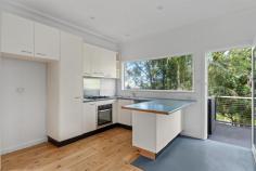 5A The Drive Stanwell Park NSW 2508 This neat & tidy 2 bedroom semi-home is positioned in the heart of Stanwell Park, only moments to the shops, cafes, school, transport and of course the pristine beach. Whether you're looking for a cosy and quaint residence or perhaps a coastal retreat to spend your weekends, this is the one for you. YOUR HOME • Step across the threshold into your charming seaside cottage, with its open plan living, 2 bedrooms and full bathroom. On the lower level you will find the laundry and additional living space, ideal as a home office, guest space, home gym, children's play area or hobby room. • Dual street access is an added benefit with off-street parking provided at the rear of the home, along with some outdoor entertaining space. • The front of the home features a generous entertaining deck which is provided ample privacy due the mature trees and gardens that embrace it. • Beautiful polished hardwood floorboards flow through the open-plan living area into both bedrooms. LOCATION • Only a moment's stroll to the pristine Stanwell Park beach which is fully patrolled, offers fantastic surf breaks and is dog friendly. • You can leave the car at home as the local cafes, school, shops, restaurants and public transport are all only minutes from your front door. • The Royal National Park is situated just 10 minutes drive away. • Stanwell Park is located approximately 1 hour South of Sydney CBD and approximately 30 minutes North of Wollongong CBD. • Embrace the quintessential coastal lifestyle and all that comes with it... swimming, fishing, bushwalking, hang gliding and family picnics in popular parklands all available only moments from your doorstep. Don't miss out on this exceptional opportunity to live in one of the Illawarra's most desirable coastal locations at an affordable price!