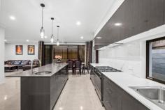 118 Danbulla Street South Ripley QLD 4306 $1,100,000 Essential Details at a Glance: 289m² Home on a 312m² Block 4 Bed, 3 Bath, 2 Car 3 Living Areas Near New, Built in 2024 by 'Home By CMA' Providence Estate Currently Owner Occupied Council Rates: $599/quarter Rental Appraisal: $840-$860/week This stunning, near-new double-storey home, built in 2024, boasts a custom design tailored for modern living. Featuring four spacious bedrooms, three beautifully appointed bathrooms, and three versatile living areas, this residence offers both style and functionality. The well-appointed kitchen is a chef's dream, complete with ample storage, a walk-in pantry and high-end finishes. Designed for low-maintenance living, the outdoor space is perfect for busy professionals seeking a hassle-free lifestyle. With its contemporary elegance and thoughtful design, this home is an exceptional opportunity for those looking to enjoy comfort and convenience in a premium setting. Architectural & Structural Features: Near-new, custom-designed double-storey home (near new - built in 2024) Steel frame construction for durability and longevity Upgraded ceiling heights: 2.7m downstairs, 2.6m upstairs Luxurious timber staircase with glass wall railing Bedrooms & Bathrooms: Four spacious bedrooms with built-ins, fans, custom-made curtains, and two with air-conditioning Generous master bedroom with large walk-in robe, air-conditioning, and a high-end ensuite Luxurious ensuite featuring his-and-hers vanities, oversized shower, freestanding bathtub, and separate toilet Downstairs bedroom functions as a second master with its own ensuite Main bathroom with shower and toilet Additional 4th toilet in laundry Living & Entertaining Spaces: Air-conditioned open-plan kitchen, living, and dining areas with upgraded 600x600 porcelain tiles Second living area: Family/media room Third living area: Kid's retreat/rumpus room upstairs, with beautiful views of Flinders Peak in the distance Oversized alfresco and outdoor entertaining area Kitchen & Laundry Spacious and well-appointed kitchen with: Stone bench tops and feature pendant lighting 5-burner gas cooktop and large oven Dishwasher and double fridge space Two sinks and a walk-in pantry Separate laundry with external access Outdoor & Additional Features: Low/no maintenance yard with astroturf and pebbles in place Excellent views across to Flinders Peak from the second storey Security screens throughout the lower level and master bedroom NBN connection for high-speed internet Mains gas connection Three-phase power connection Location*: Zoned for Ripley Valley State School (Primary - 3 Minutes) Zoned for Ripley Valley State Secondary College (Secondary - 3 Minutes) 2 Minutes Walk to Mirrigin Park 6 Minutes to Ripley Town Centre Shopping (Coles) 17 Minutes to Springfield Train Station 21 Minutes to Ipswich CBD 20 Minutes to RAAF Amberley 45 Minutes to Brisbane CBD Flood-Free Area Easy access to Cunningham and Centenary Highways