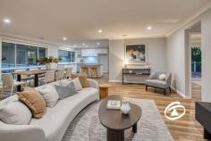 10 Maisie Rd Emerald VIC 3782 $1,050,000 - $1,150,000 Behind a White Picket Fence …. Nestled at the end of a quiet, no-through road, 10 Maisie Road, Emerald offers the perfect balance of modern living and serene surroundings. This beautifully renovated 4-bedroom, 2-bathroom home sits on a sprawling 6,295m² of land, blending open space, a secure backyard, and natural bushland to create a peaceful retreat just moments from Emerald’s charming township. Step inside to discover a thoughtfully designed home with two generous living areas—one ideal as a kids’ playroom or private retreat, complete with its own powder room. The stylish kitchen is a chef’s dream, boasting a butler’s pantry, ample storage, and quality appliances. Each bedroom is generously sized, with the master suite featuring a walk-in robe and ensuite for ultimate comfort. Designed for seamless indoor-outdoor living, the deck overlooks the lush backyard, providing the perfect spot for entertaining or simply unwinding in nature. The property’s two driveways offer convenience and versatility—one leading to a double car shed, while the other provides easy access to the side and rear of the home. If you’ve been searching for a family-friendly sanctuary with space, style, and convenience, this is it. Walking distance to Emerald township, yet tucked away in a peaceful setting, this home is a rare find.
