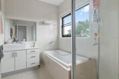 1/428 McClelland Drive Langwarrin VIC 3910 $699,000 - $749,000 Stacked with high-end finishes, clever storage, and a layout that just makes sense, this modern 3-bedroom townhouse delivers a home that's sleek, stylish, and straight-up effortless. A smart and effortless design that works for living easily has been crafted for maximum flow between indoors and out, ready for lively entertaining, kicking back, or just living your best life. Its open-plan living and dining zone is finished with large-format tiles and equally impressive natural light, filtering golden rays inside while peering out over its covered terrace and yard. The kitchen is a showstopper with warming tones and sleek stone benchtops surrounding stainless steel appliances, stepping outside to a private covered patio ready for morning coffees, sunset drinks, or lazing away. Three generous bedrooms include a downstairs master with a full ensuite and walk-through robe, with individual split-system comforts, a central bathroom and a separate toilet serving the upper level. Comfort is covered year-round with central heating and split-system air conditioning, while the remote double garage stores the wheels. Its location is near-unbeatable, just minutes from Karingal Hub, Mornington Peninsula Freeway, Karingal Heights Primary, McClelland College, and public transport, putting everything you need right at your fingertips. Whether you're a first-home buyer, a savvy investor, or looking to downsize without compromise, this one ticks every single box.