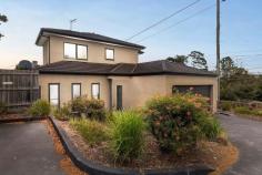 1/428 McClelland Drive Langwarrin VIC 3910 $699,000 - $749,000 Stacked with high-end finishes, clever storage, and a layout that just makes sense, this modern 3-bedroom townhouse delivers a home that's sleek, stylish, and straight-up effortless. A smart and effortless design that works for living easily has been crafted for maximum flow between indoors and out, ready for lively entertaining, kicking back, or just living your best life. Its open-plan living and dining zone is finished with large-format tiles and equally impressive natural light, filtering golden rays inside while peering out over its covered terrace and yard. The kitchen is a showstopper with warming tones and sleek stone benchtops surrounding stainless steel appliances, stepping outside to a private covered patio ready for morning coffees, sunset drinks, or lazing away. Three generous bedrooms include a downstairs master with a full ensuite and walk-through robe, with individual split-system comforts, a central bathroom and a separate toilet serving the upper level. Comfort is covered year-round with central heating and split-system air conditioning, while the remote double garage stores the wheels. Its location is near-unbeatable, just minutes from Karingal Hub, Mornington Peninsula Freeway, Karingal Heights Primary, McClelland College, and public transport, putting everything you need right at your fingertips. Whether you're a first-home buyer, a savvy investor, or looking to downsize without compromise, this one ticks every single box.