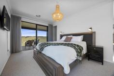 8 Moyne View Little Hartley NSW 2790 $1,450,000 - $1,550,000 This impressive architecturally designed home, completed in 2023, catches your eye from the moment of arrival. Affording an elevated perspective, with Blue Mountain escarpment views and rolling farmland outlooks, this is a home that offers a break from the bustle of city life. It is a haven of light, space and versatility with its contemporary dual-wing design. With a choice of relaxation zones and four bedrooms this home offers flexible functionality. Expansive alfresco entertaining and an enormous 4 car workshop add to this home's modern appeal which is found less than a 2 hour drive from Sydney. This is a chance to live the country lifestyle without compromising on your contemporary checklist. Breakdown of Features: Perfect single level flow with central wide entry giving way to dual wing floorplan Auto double garage with internal access; expansive 4 car workshop with separate driveway Multiple sliding doors offering seamless migration to alfresco entertaining Vast open plan living, dining and kitchen with hidden butlers pantry Ducted air conditioning throughout plus slow combustion real wood fire in main living Master bedroom with walk-through robe and luxurious full bathrooms with deep bath All bedrooms with optimal wardrobe storage, natural light and relaxing garden views Fully insulated; double glazed; cross-ventilation; 3-phase power and solar panels Reliable NBN Fixed Wireless; within catchment of Mt Vic Public School & Lithgow High Less than a 20 min drive to Blackheath and Lithgow; Less than 2 hours from Sydney Airport