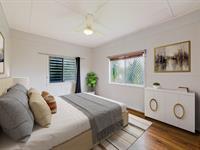 9 Ernest Street NORTH MACKAY QLD 4740 Nestled in the heart of North Mackay, 9 Ernest Street is a charming two-bedroom home that boasts character. Beautiful wooden floorboards add warmth throughout the main home, while the first level has been tiled in the bathroom, laundry, and toilet areas for low maintenance and convenience. Situated on a fully fenced 456m² allotment, this home offers privacy and a peaceful setting. The modern kitchen is designed for functionality, featuring ample storage and gas cooking, seamlessly flowing into the air-conditioned living and dining areas for year-round comfort. The main bedroom is larger than standard and includes a ceiling fan, while the second bedroom provides a cozy and inviting retreat. At the rear, a two-car carport ensures your vehicles are protected from the elements. Don't be fooled by the smaller allotment as the rear yard offers plenty of room for outdoor activities, making it an excellent space for families, pets, or those who love to entertain. Located just moments from cafes, schools, parks, IGA, a fuel station, a chemist, and more, this home offers exceptional convenience in a sought-after location.