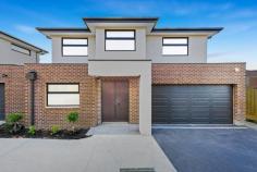 3/4 Medway Street Box Hill North VIC 3129 $1,600,000-$1,700,000 This brand-new dual-level townhouse is a meticulously designed, contemporary offering in one of Box Hill North's most sought-after locations. Just minutes from Box Hill Central's vibrant retail, dining and entertainment precinct, the home is also within walking distance of parks, childcare centres and local employment zones. Zoned for Kerrimuir Primary School and Box Hill High School, it's also perfectly positioned near public transport options. Designed with modern industrial inspiration, the home's striking facade combines textured brickwork with smooth render, creating a bold sophisticated aesthetic. The statement entryway, featuring a recessed porch and oversized timber door, offers a grand yet understated welcome. The black panel-lift garage door integrates into the design. Stunning 2.7m square-set ceilings enhance the sense of space, while opulent herringbone timber flooring flows throughout. The open-plan design is filled with natural light and large black-trimmed glass sliding doors open to a private courtyard. A centrally controlled zoned heating and cooling system ensures year-round comfort, while modern LED downlights illuminate. The ground-floor guest bedroom is a retreat, complete with a study and private ensuite. An external storage shed adds practicality. The decadent kitchen blends industrial chic with refined luxury. A four-seater breakfast island with 60mm marble-look stone, waterfall edging and feature v-panel backboards sits beneath striking black pendant lights. The splashback matches the stone benchtops while a matte-black double bowl sink with a gooseneck flick mixer is sophisticated. Finger-pull gloss white cabinetry and drawers provide storage, while quality 600mm appliances, including a gas burner cooktop, oven and dishwasher, cater to the needs of modern living. A spacious butler's pantry extends the kitchen's functionality, offering additional stone countertops, an extra sink and a second stove. Upstairs, three oversized bedrooms branch off a sunlit retreat, each with generous robe storage and ensuites. The bathrooms are luxurious, featuring floor-to-ceiling wall tiles, vanities with 60mm marble-look stone, avant-garde sink and tapware and fully frameless showers with dual shower heads and niche shelving. The main bedroom's ensuite adds an indulgent freestanding bathtub. Property Highlights: • Brand-new townhouse with high-end finishes • High ceilings, herringbone timber flooring and zoned AC • 60mm stone, quality appliances,butler's pantry