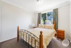 13 Baxter Place Tamworth NSW 2340 Situated on approximately 600sqm block in Westdale, you will find this beautifully presented brick home. Perfect for the whole family offering a well-sized living area with wood fireplace, well-appointed kitchen and a modern main bathroom with a separate toilet. Offering four well sized bedrooms, each complete with built in wardrobes. Other features include evaporative cooling, a single carport, single lock up garage, a fantastic back verandah for entertaining and a fully secured yard.