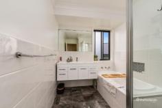 14 Dale Crescent Armidale NSW 2350 $500,000 - $550,000 Modern and low-maintenance, this four-bedroom home is an ideal investment opportunity, currently tenanted and beautifully presented. Each bedroom is equipped with built-in wardrobes, while the master suite boasts a walk-in robe and private ensuite. The heart of the home is the open-plan living and kitchen area, featuring light floating floors, reverse cycle air conditioning, and a kitchen with an island bench, two ovens and corner pantry for added convenience. The main bathroom offers a contemporary design, complete with a floating vanity, dark tiling, a deep bathtub, a shower, and a separate toilet. The property also includes a double lock-up garage with internal access, along with a neat, easy-care backyard. The outdoor space is enhanced by a garden shed and an undercover entertaining area—perfect for relaxing or hosting guests. A well-rounded property ready for investors seeking style and comfort in a sought-after location.