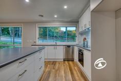10 Maisie Rd Emerald VIC 3782 $1,050,000 - $1,150,000 Behind a White Picket Fence …. Nestled at the end of a quiet, no-through road, 10 Maisie Road, Emerald offers the perfect balance of modern living and serene surroundings. This beautifully renovated 4-bedroom, 2-bathroom home sits on a sprawling 6,295m² of land, blending open space, a secure backyard, and natural bushland to create a peaceful retreat just moments from Emerald’s charming township. Step inside to discover a thoughtfully designed home with two generous living areas—one ideal as a kids’ playroom or private retreat, complete with its own powder room. The stylish kitchen is a chef’s dream, boasting a butler’s pantry, ample storage, and quality appliances. Each bedroom is generously sized, with the master suite featuring a walk-in robe and ensuite for ultimate comfort. Designed for seamless indoor-outdoor living, the deck overlooks the lush backyard, providing the perfect spot for entertaining or simply unwinding in nature. The property’s two driveways offer convenience and versatility—one leading to a double car shed, while the other provides easy access to the side and rear of the home. If you’ve been searching for a family-friendly sanctuary with space, style, and convenience, this is it. Walking distance to Emerald township, yet tucked away in a peaceful setting, this home is a rare find.