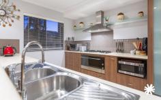 26 Barang Cct Karawara WA 6152 $1,000,000 Tucked away in one of Karawara’s most peaceful and highly regarded streets, this expansive 2005 built Webb & Brown-Neaves 6-bedroom, 3-bathroom home plus study is the perfect blend of space, style, and functionality. Designed to accommodate large or multi-generational families, this home offers an impressive layout with multiple living areas, high-quality finishes, and modern comforts throughout. The heart of the home is the open-plan living and dining area, seamlessly integrating with the modern kitchen before flowing out to a covered alfresco, ideal for year-round entertaining. The kitchen is a chef’s dream, boasting stone benchtops, a 1200mm gas cooktop and oven, a brand-new Fisher & Paykel dishwasher, filtered water, and extensive custom-built cabinetry, ensuring both practicality and style. Upstairs, a generous theatre room provides a separate retreat, perfect for family movie nights or a quiet space to unwind. Brand-new carpet has been installed upstairs, adding to the home’s fresh and inviting feel, while bamboo flooring throughout the lower level creates warmth and durability. This home has been thoughtfully designed to maximise comfort and storage. A roof space attic offers additional storage, perfect for keeping the home clutter-free, while the large double lock-up garage provides ample space for vehicles and extra storage. Each of the six bedrooms spread over both levels are well-proportioned, ensuring plenty of room for the whole family. The three bathrooms are modern and well-appointed, offering convenience and style. With a dedicated study at the front entrance any work-from-home set up can be comfortably achieved. Ducted air-conditioning both upstairs and downstairs offer year round comfort. Positioned on a quiet, family-friendly street with only local traffic, this home is within walking distance to the popular Karawara Shopping Centre, providing easy access to a range of grocery stores, cafes, restaurants and essential services. Major transport routes along Manning Road and Kent Street are just a short stroll away, making commuting a breeze. This exceptional property is ideally suited for growing families looking for room to spread out, or multi-generational households needing separate living zones for added privacy. With an abundance of space, high-quality finishes, and a prime location, this is a rare opportunity to secure a forever home in Karawara’s most sought-after pocket. Don’t miss out-make your enquiry TODAY! Features that you will love: 5kW rooftop solar Ariston 1200mm gas cooktop near new Fisher & Paykel oven Stiebel Eltron electric instantaneous hot water system to kitchen filtered tap to kitchen near new ceiling fans to upstairs bedrooms near new instantaneous gas hot water system (2 yrs old) Termite treatment warranty until Sept 2025