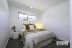 20 Madeline St Latrobe TAS 7307 $825,000 Are you looking for less maintenance but not ready to sacrifice space or style? This elegant, quality-built, brand new home is set on a low-maintenance 471m² block with its own title and offers a stylish living solution without the upkeep of a larger property. Elegant Design & Entry – On entering the property you are welcomed by an exposed aggregate driveway with a lock up garage and additional off-street parking to accommodate a second vehicle, caravan, or trailer. The homes front entrance has a sense of grandness, with its unique multi-direction stairway leading one direction to the sheltered timber-lined entry landing and another directly into the landscaped, fully fenced garden. Inside, a spacious entry boasts ample built-in storage on both sides creating a welcoming space without compromising roominess. Light-Filled Living with Scenic Views – Enjoy sunlit open-plan living spaces with views of Bells Parade parklands and glimpses of the Mersey River through the trees. Imagine enjoying the changing of the seasons with Autumn colours right from your windows! Primary Bedroom Suite – The expansive main bedroom, is a generous 4 x 5m and overlooks serene parkland views. It can comfortably accomodate a king size bed with enough room left for additional furniture. There’s even a convenient TV outlet installed for leisurely in-room TV viewing. Being located away from the rest of the sleeping quarters and with its own spacious walk-in robe and a stylish ensuite, this room offers ultimate privacy & peace. Additional Bedrooms/Bathroom Area – In a separate section of the home you’ll find two additional, well-sized bedrooms, a separate toilet, and a large bathroom featuring a floating vanity, walk-in shower, and a freestanding soaker tub, which is perfect for unwinding at the end of a long day. Functional & Stylish Laundry & Garage Space – The thoughtfully designed laundry room includes ample storage, a clever in-cupboard laundry hamper, and direct outdoor access. The extra height, single garage features a 10FT ceiling, ideal for large vehicles. Sleek Kitchen & Pantry – The kitchen impresses with elegant matte dark green custom cabinetry and waterfall-edge countertops. A plumbed-in fridge alcove, built-in air-fryer/oven, electric cooktop and a dishwasher offer a kitchen space that is functional yet easy to keep clean. A walk-in pantry located near by is equipped with ample shelving, power points, and countertop space, keeping the main kitchen clutter-free. Easy Access for Indoor-Outdoor Living – From the dining area, step directly out to an extra large entertaining area and fully fenced garden that wraps around the home. Low-maintenance garden beds and artificial turf make upkeep a breeze, leaving you more time to enjoy the scenic views and relax with a morning coffee or a glass of wine while watching the world go by. Extra Features Beautiful Tasmanian Oak floors flow through the hall, kitchen, and living areas, while the wet areas feature practical tiles and the bedrooms offer the cosiness of carpet. A Daikon Reverse Cycle Split System keeps the home cool in Summer and warm & cosy in Winter, while block-out roller blinds throughout also assist with climate control and offer privacy. Prime Location & Community Amenities – Situated close to local restaurants, scenic walking trails, and essential amenities like the local pharmacy and shops, this home truly lets you enjoy Latrobe living at its best. Move in, Relax, & Savour Life in Bells Parade in a Home Where Style Meets Convenience! Call Colin on 0408 666 301 to book your VIEWing.