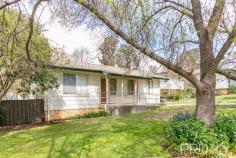 10 Banksia Crescent Tumut NSW 2720 $320,000 Set upon a generous 703m² allotment sits this three-bedroom sun filtered family home. Boasting a large free flowing open plan kitchen, living and dining areas, with the bedrooms positioned to the rear of the home for privacy of living, you will love the low maintenance lifestyle on offer. Do not miss your opportunity to secure this great property, call today to book your inspection. Premiere Features: - Three great sized bedrooms, positioned away from the major living areas - Centrally located bathroom with combined shower over bath, single vanity and toilet - Open style kitchen with electric cooktop and overlooking the rear deck and yard - Large free flowing living and dining, with split system air conditioning and overlooking the adjacent park - Internal laundry with rear deck access - Covered front entry with wheelchair access - Large timber rear deck over the yard - Rear vehicle access - Fully fenced and low maintenance rear yard - Approximate 703m² allotment - Currently tenanted at $340 per week until 24th January 2025 Do not miss your opportunity to secure this sun-filtered family home, call today to book your inspection!