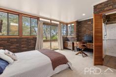 28 Boonderoo Road Tumut NSW 2720 Positioned on an extremely generous allotment of approximately 9.8 acres and boasting a uniquely designed solid brick family home, 28 Boonderoo is an opportunity not to be missed. Boasting a free flowing, sun-filtered, four-bedroom, three-bathroom family home and set upon a generous small acreage allotment on the very edge of the picturesque township of Tumut, you will love the endless possibilities of 28 Boonderoo Road. Being offered to the market for the first time since the original build, you do not want to be beaten by your competition. Call today to book your inspection and secure one of the best lifestyle and development opportunities left in town. Premiere Features: - Four great size bedrooms, three boasting built in robes and two with ensuites positioned at either end of the plan (both ensuites boast shower, toilet and vanity) and all four bedrooms with direct external access - Centrally located main bathroom with separate shower and separate bath, vanity and toilet - Galley style kitchen in the heart of the home with electric cooktop, ample cabinetry and additional walk-in pantry - Open plan and free flowing living areas throughout the Eastern side of the home, including living, dining and family areas, all complimented by a large centrally located open fire place and an abundance of natural light throughout - Internal Laundry - Spacious carport with direct internal access under the roofline and positioned to the rear of the home - Solar power connected - Approximate 9.8-acre allotment zoned large lot residential, ideal for further subdivision or that lifestyle opportunity you have been looking for all on the very edge of town - The house itself boasts mains power, town water and septic sewage, all services available in the immediate area should further development be preferred (including natural gas and NBN) - Currently divided into two main paddocks including dam water and backing on to the Glen Estate Tumut, 28 Boonderoo is just a few moments' drive to all major services Why Tumut? Considered as the gateway to the Snowy Mountains, Tumut is a picturesque township resting by the river and located approximately 70 minutes to Wagga Wagga. Popular amongst snow ski enthusiasts during the winter months and boasting a plethora of outdoor activities during the warmer months, including water skiing, camping, fishing in the dams, rivers and estuaries, mountain bike riding and walking tracks. The township itself boasts a thriving central business district and copious local and sporting events throughout the calendar year and a welcoming community. Tumut really does offer a great lifestyle and caters for all ages..