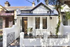 63 Taylor St Annandale NSW 2038 This thoughtfully upgraded traditional terrace offers a low-maintenance, single-level layout designed to maximize natural light and space. Situated in a peaceful location, it boasts an enviable lifestyle address in a tranquil cul-de-sac, with Annandale's cafes, parklands, and CBD buses just moments away. The property is also just meters from parklands that stretch all the way to the harborside. - Classic character home with a charming original façade - Freshly painted interiors complemented by rich dark timber flooring - Light-filled open-plan living with separate lounge and dining areas - French doors open to a decked courtyard with BBQ space - Modern stone kitchen with gas cooktop and dishwasher - Two bedrooms with built-ins and a full bathroom with integrated laundry - Peaceful, leafy street with ample resident parking options.