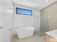 3/21 Warrah St Ettalong Beach NSW 2257 $1,250,000 - $1,300,000 Welcome to 3/21 Warrah Street, Ettalong Beach. This brand new townhouse will surely impress with quality fixtures and finishes throughout and its own private northeast facing courtyard all within 500 meter level walk to Ocean Beach The townhouse features include: - Three large bedrooms all with robes and ceiling fans the master conveniently located downstairs with a walk-in robe and designer ensuite bathroom with floor to ceiling tiling, semi frameless shower, toilet, and custom vanity - The main bathroom features floor to ceiling tiling, shower, free standing bathtub, toilet and custom vanity. A powder room downstairs with a toilet and washbasin. - Generous open plan lounge and dining flows to the covered alfresco space. A second living area is positioned upstairs with a double linen press. - The kitchen is large featuring Fisher Paykel dishwasher, 900mm induction cooktop, under bench oven, slide out drawers to pantry ideal for maximising space and 20mm tops - A generous covered alfresco space flowing off the dining area is perfect for entertaining family and friends and a northeast facing courtyard with a small grass area as well. - The ceilings are 2.7 metres that accentuate size and space with 7.2kw Fujitsu ducted air conditioning throughout the home and alarm system for security - Engineered Oak timber flooring in the downstairs dining and living are and from the stairwell and upstairs bedrooms all carpeted - The home offers an oversized double garage with internal access and automatic door with a fitted laundry unit - Natural gas and NBN connected This is a truly unique property in a blue-chip location that is a short walk to Umina Beach, Public Transport and all local eateries, cafes and restaurants.