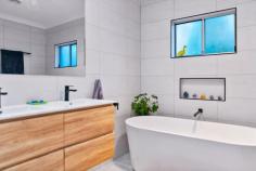33 Seventh Avenue Katoomba NSW 2780 $1,100,000 - $1,200,000 Set in a quiet street, this recently renovated, north-facing family home offers comfort, style, and opportunity. The first floor is thoughtfully designed for family living, while the large downstairs studio adds flexibility for modern lifestyles with the potential for Airbnb, intergenerational living, or a studio workspace. The expansive block features a bush outlook that ensures tranquility and privacy and is a short walk to the spectacular Minnehaha Falls. Key Features: • Spacious Living: The 3-bedroom, 2-bathroom first floor boasts a seamless blend of style and functionality. The large, north-facing deck invites alfresco dining, where you can relax and soak in the peaceful surroundings. • Modern Comforts: Enjoy an updated kitchen, bathroom, and ensuite, along with built-in robes (including a master bedroom with a walk-in robe). Contemporary floorboards, gas heating, and a security camera system ensure comfort all year round. • Versatile Floorplan: The additional downstairs studio, kitchenette and bathroom, with separate external access, make it ideal for a home business, intergenerational living, or Airbnb income potential. • Ample Storage: A double lock-up garage with 3 phase power supply, and an additional workshop provide generous space for storage or hobbies. • Idyllic Setting: Situated on a 2,605sqm tranquil block that borders Yosemite Creek, this location offers a serene backdrop to everyday life. Whether you're a growing family, a savvy investor, or someone seeking a peaceful retreat, this home checks all the boxes.