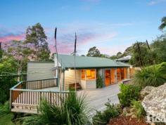 94 Ryans Rd Umina Beach NSW 2257 $970,000 - $1,050,000 Nestled on a quiet street with an amazing bush backdrop, this high-set 3 bedroom family home offers beautiful district views, and complete privacy. While feeling secluded, the property is situated within easy access to primary and secondary schools, Everglades Country Club, shopping centres and the golden sands of Umina and Ettalong beaches, with Woy Woy railway station just a 4.1km drive, commuting to work is a breeze. The home boasts a light-filled and spacious open-plan living-dining area with cathedral ceilings, skylights, and generous windows. The updated country-style kitchen surprises with real timber benchtops and modern appliances. 3 bedrooms look out onto forest and mountain views, all with built-in robes, and the large main with a walk-through robe and ensuite. The surprises continue outside with front and back decks providing ample space to entertain your guests in a spectacular bush setting. There are low-maintenance landscaped gardens (with a mature lime-tree), and plenty of off-street parking for up to 3 vehicles. Other features of this property include - - Air-conditioning - Elevated 834.7 Sqm block - Timber entertaining deck - Main bathroom with bath & oversize shower - Separate laundry room