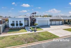 30 James Street Echuca VIC 3564 $849,000 From the moment you step through the double doors, your dream home awaits. This fabulous home and property offers a perfect blend of modern contemporary comfort and excellent year round indoor and outdoor enjoyment. In a peaceful area of the highly sought after Westwood Park Estate this lovely family home enjoys neutral tones, modern fixtures with an abundance of natural light. This inviting home is immaculate and stylish throughout. Excellent separation between the three family bedrooms and central bathroom, with a fabulous fourth Master bedroom featuring a retreat with a beautiful bespoke walk-in-robe and fully tiled luxury en-suite with a freestanding bath, walk in shower with seating, twin vanities and underfloor heating. If you love to entertain this home is complimented with a spacious undercover outdoor area with a wood fire which overlooks a gorgeous large solar heated, salt chlorinated in-ground swimming pool perfect for our lovely climate in Echuca. The chef's kitchen comes complete with loads of storage and bench space, a stylish 900mm Electrolux steam oven and a 5 burner gas hob, bosch dishwasher and a very practical walk-in pantry. The kitchen/dining area accomodates a 10 seater dining table and a sunny second seating area with direct access via patio doors out to the decked area featuring a fire pit. A perfect retreat for families and entertaining. Other rooms include a useful study or 5th bedroom, a central bathroom, internal access from the double remote garage and also offering external parking for 4 extra cars. The side carport has extra height ideal for a caravan, trailer or boat storage. OTHER NOTABLE FEATURES : • Gardens have an inground irrigation system • Security cameras • High speed NBN connected • Ducted heating and cooling throughout and infloor heating in the ensuite • 5.2 KW solar • Updated pool equipment regulary serviced • Small garden shed at the rear • .Whether you are relaxing on your private deck or hosting gatherings, this property is designed for those who appreciate the finer things in life. Do not miss the opportunity to own this remarkable home and experience the ultimate in entertaining. A perfect family friendly home. FEATURES: • 5.2KW Solar • Fire Pit Area • Heated Solar Inground Pool • Wood Heater In Undercover Entertaining Area