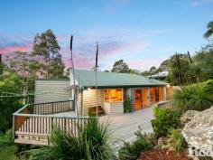 94 Ryans Rd Umina Beach NSW 2257 $970,000 - $1,050,000 Nestled on a quiet street with an amazing bush backdrop, this high-set 3 bedroom family home offers beautiful district views, and complete privacy. While feeling secluded, the property is situated within easy access to primary and secondary schools, Everglades Country Club, shopping centres and the golden sands of Umina and Ettalong beaches, with Woy Woy railway station just a 4.1km drive, commuting to work is a breeze. The home boasts a light-filled and spacious open-plan living-dining area with cathedral ceilings, skylights, and generous windows. The updated country-style kitchen surprises with real timber benchtops and modern appliances. 3 bedrooms look out onto forest and mountain views, all with built-in robes, and the large main with a walk-through robe and ensuite. The surprises continue outside with front and back decks providing ample space to entertain your guests in a spectacular bush setting. There are low-maintenance landscaped gardens (with a mature lime-tree), and plenty of off-street parking for up to 3 vehicles. Other features of this property include - - Air-conditioning - Elevated 834.7 Sqm block - Timber entertaining deck - Main bathroom with bath & oversize shower - Separate laundry room