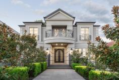 31 Kalang Rd Camberwell VIC 3124 A domain of lavish exclusivity, this opulent masterpiece exudes a majesty which works in harmony with exquisite craftsmanship, breath-taking dimensions and high-end fixtures and fittings. Revolutionary living for a highly discerning family, a soaring façade with double iron doors introduces the intricate panelled walls, stunning coffered ceilings and a chandelier-crowned staircase. Rich timber flooring glide past the bay-window study with built-in cabinetry to the private lounge room and the separate open-plan dining/family room. Here, a marble feature wall embraces the gas log fire while bi-folds reveal a travertine paved alfresco that looks directly into the show-stopping glass-walled swimming pool. Alongside, there’s a wall of bi-folds that seamlessly join the outdoors to the fully enclosed alfresco room with second kitchen, fitted with two rangehoods, one for the BBQ and the other for the gas cooktop. Extending into a games room with a bathroom, this entire space is ideal for large-scale gatherings. With a lift servicing all three levels, there’s a teen retreat, downstairs dedicated theatre and a wine cellar. A massive marble island heralds the elite design of the Miele kitchen with butler’s pantry, appointed with an integrated refrigerator/freezer, oven, steamer, coffee machine and induction cooktop. A total of five bedrooms, six bathrooms and two powder rooms ensure that you can accommodate everyone in absolute comfort. With a ground floor guest suite, head upstairs to the grand master bedroom, boasting a substantial dressing room, north balcony and a dual vanity ensuite with a glassed-in shower and a marble wall beside the free-standing tub. Features automatic curtains, in-floor heating, separately zoned/individual heating/air-conditioning, ducted vacuum and a six-car basement garage. Zoned for Camberwell High School, walk to Lynden Park, Hartwell Primary School, the train, vibrant cafes, Leo’s Supermarket and the tram to Mount Scopus, Presbyterian Ladies’ College and Deakin University. Close to Middle Camberwell Village, Strathcona and Siena College..