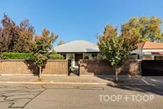 43 St Anns Pl Parkside SA 5063 Privately set amidst the leafy streets of Parkside and located on the city fringe close to the open greenspaces of the parklands, this freestanding return verandah symmetrical character home is a timeless blend of elegance and functionality. Set on a generous 602sqm allotment with front and rear lane access, this charming residence offers a harmonious modern living layout with the convenience of inner-city location, just 2 km's from the centre of the CBD. From the moment you arrive, beyond the privacy of the brush fence, you're greeted by the established garden and patio entrance that opens to the light and bright central hall, detailed with decorative ceilings and lovingly preserved polished floorboards. Immediately the warmth and character of three expansive bedrooms, adorned with impressive fireplaces, invite you in, each room echoing tales of comfort and history. The main bedroom, with WIR and ensuite access to the Bathroom, is large enough to be utilised as a second living room depending on your needs. The heart of the home reveals a contemporary open plan kitchen and living area, where every family gathering or entertaining experience is framed by stunning views of the established rear garden through the floor to ceiling rear windows. The skillion extension is lit by the North facing hi-light windows, where you can enjoy breakfasts from the island bench or dinners with friends in the integrated dining room with bay window. An underground cellar provides valuable storage space and the laundry with second toilet completes the modern extension of the traditional character cottage. Outside the property continues to deliver with outdoor entertaining deck ideal for Sunday BBQ’s, stepping out to the lawn and vegetable garden. Rear lane access from both the newly constructed two car garage, that provides ample storage and currently doubles as a home gym, and access from the original rear gate to the property ensures you are never short of secure parking and retain access to landscape as you desire. This Parkside abode offers outstanding value, delicately balancing classic elegance with contemporary features. Whether you're captivated by its historic charm or the allure of city fringe living, this home promises a lifestyle that's both enriching and convenient. Opportunities like this are rare, don’t miss your chance to own a jewel of Parkside. What we love about 43 St Anns Place Parkside - - Free-standing character residence on over 600sqm - Expansive open plan kitchen/living with tranquil backyard views - Three generous bedrooms, each with ornate fireplaces - Elegant decorative ceilings and immaculate polished floorboards - Newly installed Morse combustion heating for year-round comfort - Cellar accessed via kitchen for storage or wine enthusiasts - Renovated, modern bathroom combining style and comfort - New two-car garage to compliment carport and off-street parking - Exceptional dual street access from St. Anns Place and Stamford Lane - Located just minutes away from Hutt Street Cafes, the CBD and parklands - Zoned for Glenunga International High School and Parkside Primary School.
