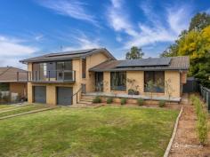 52 Gordon Street Armidale NSW 2350 $575,000 - $630,000 Welcome to 52 Gordon Street, a beautifully renovated three-level home nestled in a sought-after North Hill location. Situated close to primary schools, parks, and corner stores, this property combines modern living with everyday convenience. This thoughtfully updated residence boasts three generously sized bedrooms, each with built-in wardrobes and plush grey carpet. One bedroom features a built-in study desk, while another is equipped with a TV mount — ideal for a relaxed, modern lifestyle. The main bathroom has been stylishly renovated, complete with an oversized shower, heated towel rack, floating vanity, and a separate toilet. Upstairs, you’ll find the light-filled living, dining, and kitchen space. The living room is enhanced with high ceilings, a built-in TV unit, and soft carpeting. The sleek kitchen is appointed with brand-new appliances, including a black SMEG oven and dishwasher, subway tiling, black fittings, ample cupboard space, and reverse cycle air conditioning. The adjoining dining area opens onto two balcony spaces, offering seamless indoor-outdoor dining options. On the ground level, the home features a mudroom with additional toilet facilities, a laundry, and internal access to the double lock-up garage. Outside, the property continues to impress with manicured garden beds, a fenced area with a boutique-style chicken coop, solar panels, and easy-to-maintain lawns — all set on a generous 910 square metre block. Experience contemporary comfort in a prime location at 52 Gordon Street — a perfect blend of style, space, and convenience.
