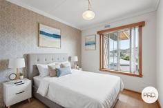 105 Allumba Street Howrah TAS 7018 $795,000 Welcome to your future dream home at 105 Allumba Street, Howrah! This 300sqm spacious residence offers a perfect blend of comfort, style, and functionality, making it an ideal choice for families seeking a large family home. Five generous bedrooms of different sizes over two floors provide space for the entire family. A popular option would be Airbnb/rent the ground floor for additional income and still live comfortably upstairs. There are three well appointed bathrooms. Enjoy the luxury of spacious living areas, complete with a large formal living room with access to the forward sunroom and upstairs entrance. The family room faces the river and mountain with full length windows and there is a separate dining room and kitchen. Downstairs features a huge rumpus perfect for entertaining or relaxing with loved ones. Separate family laundry downstairs with easy access to the back yard. Step outside to discover the private backyard, perfect for children to play or for hosting family barbeques. There is single garage currently used as a workshop, a carport out front, and additional open parking spaces for up to three vehicles, you'll never have to worry about parking again. Constructed in 1965, it combines classic charm and with just a few updates you will have a winner. Located in the desirable neighbourhood of Howrah, you'll enjoy easy walking access to local amenities, schools, parks, and popular Howrah beach. Ample natural light and scenic views from various rooms. Close proximity to public transport and shopping centres. This property is a rare find and is sure to attract attention!