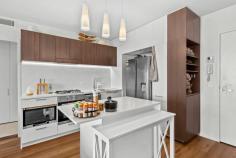 703/16 Aspinall St Nundah QLD 4012 $500,000s Welcome to 703/16 Aspinall Street, an exceptional 1-bedroom, 1-bathroom apartment that offers the perfect blend of modern living and urban convenience in the heart of the Nundah Village. This contemporary residence is designed to provide an easy lifestyle with unparalleled amenities. Nestled in the lively Nundah Village, this apartment places you right at the centre of a bustling community with a variety of cafes, restaurants, and local amenities at your fingertips. Enjoy easy access to Nundah Train Station and effortless connectivity to the rest of Brisbane. The standout feature of this apartment is its impressive terrace balcony, offering a private outdoor sanctuary perfect for alfresco dining, entertaining guests, or simply relaxing. This generous space extends your living area and enhances your everyday enjoyment. This stylish apartment features a well-designed layout that maximizes space and natural light. The property includes a dedicated car space, providing you with the convenience of secure and hassle-free parking. Whether you're seeking an urban retreat or a vibrant base, this apartment is the ideal choice. Key Features: Open-plan living and dining area, perfect for entertaining or relaxing in style. Sleek and modern bathroom with a spacious shower and quality fixtures. Private terrace balcony with urban views, ideal for outdoor dining or enjoying morning coffee. Located in the heart of Nundah, known for its vibrant lifestyle, cafes, and boutique shops. Over-bonnet storage locker included with parking space. Close proximity to Nundah train station and bus routes for easy commuting. Easy access to major roadways, offering a quick drive to Brisbane CBD and the airport. Please call Simon Petrie at 0439 668 867 or Ben Craig at 0403 746 562 for more information