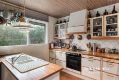 5 Cooke Pl Moss Vale NSW 2577 $1,295,000 Imagine this: A home tucked away at the end of a peaceful cul-de-sac, surrounded by nature - a quiet escape. Picture this: A warm and inviting architecturally designed retreat - every detail made for comfort, style and functionality. Dream of: Cosy evenings by the fireplace and sun-drenched afternoons on the north-facing deck - the feeling of total privacy is all around you. Whether you're entertaining or unwinding, this home is a serene and beautiful place to be. Ready to make it yours? Please get in touch; we look forward to showing you what this property has to offer. Features include: Primary bedroom with ensuite, built-in and walk-in robe Double glazing and triple glazing on fixed windows Kauri pine solid timber flooring and pine ceilings throughout Slow combustion fireplace, gas bayonet, Fujitsu split system cooling Complete under-house storage (previously used as a Teenage retreat and home office) Enclosed rear verandah/sunroom Covered vestibule with double entry Open plan living, dining and kitchen Electric oven and stovetop Fully fenced Partially double brick Designed and built by a local Norwegian craftsman for a Scandinavian family (only one owner) Large, low-maintenance garden