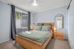 8/9 Ferry Place Gordon ACT 2906 $549,000 Perfectly positioned at the end of a quiet cul-de-sac in a friendly and well-maintained complex, this delightful single-storey, two-bedroom townhouse offers an ideal lifestyle for first home buyers, downsizers, or small families. With great neighbours and a strong sense of community, this home is a rare find in the sought-after suburb of Gordon. Set on a flat block and surrounded by leafy native trees with a picturesque mountainous backdrop, you'll feel an instant sense of calm and belonging as you approach. A charming low maintenance front courtyard with space for an additional car and trailer, framed by established trees provides a welcoming entrance and a peaceful spot to relax. With a 6.6kw solar system that provides ample amount of power for the house resulting in very low to no power bills. The house also includes a large heat pump hot water system providing consistent, reliable and green hot water to the property. Inside, the home is filled with natural light thanks to floor-to-ceiling windows in the open-plan living, dining, and kitchen area. Beautiful timber flooring flows throughout, creating a warm and cohesive space that's perfect for everyday living and entertaining. The kitchen has been tastefully updated and features ample storage, a gas cooktop, dishwasher, and stylish finishes to suit modern tastes. Both bedrooms are generously sized and include built-in wardrobes, while the centrally located bathroom offers a full-sized bath and a separate toilet for added convenience. The home includes a split system air conditioner and fans in each bedroom for year-round comfort. The laundry includes storage and has direct access to the rear yard. The dining room offers direct access to a spacious, covered outdoor entertaining area, while the backyard-reminiscent of those found in new builds-wraps around the rear of the home, creating multiple zones for entertaining, relaxing, and play. There's a grassy area perfect for kids or pets, and ample room for gardeners to create something special with flowers, shrubs, or veggie patches. This peaceful location is also incredibly practical - just a short stroll to the much-loved Gordon Adventure Playground and the nearby oval, perfect for weekend cricket or footy. Local bike paths wind through the area, giving kids and adults alike the chance to explore the outdoors safely. During the festive season, enjoy the magical view of Gordon Hill lit up in Christmas lights from your very own backyard. Conveniently located only minutes from Lanyon Marketplace and a short drive to Southpoint Tuggeranong, everything you need is right at your fingertips. Property details (approx.): Block: 340 sqm Living: 87.90 sqm Garage: 21.71 sqm EER: 2.5 Rates: $510 pq Land Tax: $877 pq Body Corp: $621.79 pq (sinking fund included) Built: 1991 Close proximity to: Gordon Primary St Clare of Assisi Primary Lanyon High School MacKillop College Lanyon Marketplace Canberra Hospital