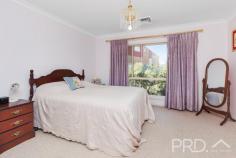 11 The Pavilion Tumut NSW 2720 $799,000 Perched high in an exclusive and quiet cul-de-sac, with elevated views of the picturesque town of Tumut and its surrounds. You will love the versatility and functionality of this well-appointed family home. Offering great diversity of living, both upstairs and down, 11 The Pavilion boasts four great sized bedrooms, multiple living rooms and rumpus area, study and a total of three bathrooms over the two levels. With additional timber decks on both levels and ample secure space for vehicles, boats or caravans. This is a central opportunity that is not to be missed. Call today to book your inspection! Premiere Features: - Four great sized bedrooms all with ducted reverse cycle air conditioning, master boasting walk in robe and ensuite - Main bathroom with separate bath and shower room and powder area positioned adjacent with separate toilet - Ensuite boasts shower, toilet and single vanity - Large centrally located entertainer's kitchen with electric cooktop, stainless appliances including dishwasher, ample cabinetry options and bench space, including display cabinetry and large island bench (boasting water, power and breakfast bar) - Free flowing open plan tiled living and dining area's directly off the kitchen, all designed to take in the picturesque surrounds and capitalise on its elevated positioning - Formal additional lounge room upstairs - Formal study upstairs with direct external deck access - Partially covered timber deck, perfect for outdoor entertaining or simply taking in the picturesque surrounds - Fourth bedroom with built-ins is located downstairs and currently used as a rumpus room - Formal rumpus with direct external access - Third bathroom positioned downstairs with shower, toilet and single vanity - Great sized laundry with external access to rear yard - Downstairs covered external entertaining - Double lockup garage with direct internal access and additional access to secure dry storage and subflooring - Secure lock up shedding with additional 2 side awnings, perfect for additional cars and or boats - Garden shedding - Ducted reverse cycle air conditioning throughout the upper level - Internal stairs - Approximate 1,016m² allotment with low maintenance manicured grounds - Walking distance to major local sporting and recreational facilities Do not miss your opportunity to secure this very versatile family home with an elevated aspect of the picturesque surrounds of Tumut.
