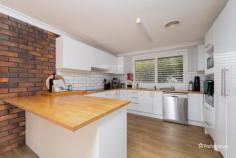 19 Baldwyn Street Armidale NSW 2350 $545,000 - $595,000 Nestled in a quiet cul-de-sac in the highly sought-after South Hill area, 19 Baldwyn Street offers comfortable family living in a convenient location—just moments from corner stores, netball courts, and local parks. This solid three-bedroom brick home features a generous open-plan living space, enhanced by stylish downlights, ducted air conditioning and plantation shutters, creating a bright and welcoming atmosphere. The functional kitchen is well-appointed with crisp white cabinetry, warm wooden benchtops, a dishwasher, and ample storage, flowing seamlessly into the adjoining dining area. All three bedrooms are carpeted and include built-in robes, while the master boasts its own private ensuite. The main bathroom is ideal for families, offering a bath, separate shower, and a separate toilet for added practicality. Step outside and enjoy year-round entertaining under the undercover alfresco area, with a fully fenced backyard perfect for children and pets. Neatly landscaped gardens, a garden shed, double carport, and solar power complete this impressive package. Don’t miss the opportunity to secure a well-presented home in one of Armidale’s most popular family-friendly pockets.