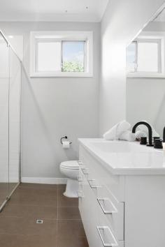 6 Fletcher Street Helensburgh NSW 2508 $1,270,000 This beautifully renovated cottage has been thoughtfully transformed into a contemporary entertainer's sanctuary, blending charm, style, and functionality. Move-in ready, it's the perfect home for those seeking comfort, convenience, and a touch of luxury. Features include: Three spacious bedrooms, including a master with a large walk-in robe for plenty of storage. A sleek, modern kitchen featuring stone benchtops and a handy servery window, ideal for entertaining. Covered outdoor entertaining area with bi-fold windows opening to the back deck - perfect for hosting BBQs or enjoying drinks with friends. A fully fenced yard with beautifully landscaped gardens, offering a secure and spacious haven for children and pets to play. Huge remote-entry garage with ample storage space for all your needs. A tranquil yet convenient location with a short stroll to trains, schools, the town centre, and scenic bushwalks. This property offers the perfect combination of style, space, and location-don't miss out on this entertainer's dream! YOUR LIFESTYLE • This is one of the only remaining areas that you can find a peaceful regional lifestyle less than an hour from Sydney. It offers all of those charming lifestyle benefits that one would associate with small town living:- bushwalking, swimming holes, bike tracks, sporting clubs, cafes and of course plenty of friendly people. • Picturesque Stanwell Park Beach is less than 10 minutes drive. Enjoy coastal living without the huge price tag. Helensburgh is becoming an increasingly popular suburb so there is no better time than today to secure your own little haven in this family friendly area. Only 45 minutes South of Sydney and 30 minutes North of Wollongong.