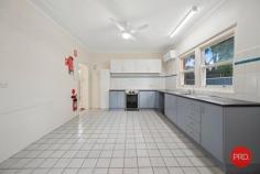 31 Bonville Street Coffs Harbour NSW 2450 $879,000 to $929,000 Positioned in a highly sought-after location just a short stroll from the heart of the Coffs Harbour CBD, 31 Bonville Street offers a rare blend of character, flexibility, and future potential. This solid double brick residence sits on a generous 777.8m² allotment with coveted R4 high-density residential zoning, opening the door to a range of development or investment opportunities. The home features a versatile floor plan that can be easily configured to suit a variety of living arrangements, offering either three or four bedrooms depending on your needs. It includes a well-maintained bathroom and an additional separate toilet, providing practicality and convenience for families, guests, or shared accommodation. Rich in charm and timeless appeal, the property retains many of its original features, including polished timber floors, soaring high ceilings, and period details that reflect its classic heritage. These character elements combine with solid construction to create a home that is both warm and welcoming. Functionality has also been carefully considered, with a carport at the front of the property and valuable rear-lane access to additional off-street parking. A concrete driveway begins at the front of the home and runs through the drive-through carport, extending all the way to the shed at the rear, providing easy and secure vehicle access along the side of the house. The rear lane is fully kerbed and guttered right to the boundary, offering seamless entry to the back of the property. Previously adapted for disability living, the property is thoughtfully equipped to accommodate accessibility needs, making it an ideal choice for supported living or continued use in a similar capacity. At the rear of the property, you'll find a shed offering extra storage or workspace, further enhancing the practicality of the home. Whether you're seeking a character-filled residence close to the city, a smart investment with future development upside, or a centrally located property with adaptable living arrangements, 31 Bonville Street delivers on all fronts.