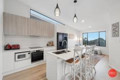 202 Dress Circle Coffs Harbour NSW 2450 $819,000 - $839,000 If you've been searching for a home that offers stunning views and a well-thought-out layout to suit a relaxed yet functional lifestyle, this could be just what you've been waiting for. Designed with space and privacy in mind, this property strikes the perfect balance between low-maintenance living and stylish comfort. Step through the elegant blackbutt timber front door and be welcomed into a spacious entryway that leads directly to the sunlit master suite. Featuring double-hung windows that capture the natural light, a walk-in robe, and a sleek ensuite, this retreat is both practical and peaceful. Convenient internal access from the remote-controlled single garage is also located on this level. Just a few steps down, you'll find the open-plan living, dining, and kitchen zone. While the interiors are beautifully appointed, the real showstopper is the view - take in sweeping sights of Muttonbird Island and the city escarpment from your living room. Whether you're entertaining friends, sipping a sunset cocktail, or curling up with a book, this space will quickly become your favourite spot in the home. Continue down and you'll discover a versatile space that could function as a second living area or third bedroom. Complete with a walk-in robe or storage space and its own private entrance, this room is ideal for a young adult craving a little independence. The main bathroom, finished in calming neutral tones with a full bathtub, is also located on this level. One more flight down and you'll find another generous bedroom featuring built-in robes, ceiling fans, and expansive windows that frame yet more breathtaking views. This room opens onto a deck - perfect for quiet study sessions or simply soaking in the scenery. You'll also find the laundry and drying area thoughtfully tucked away on this level. The outdoor spaces are beautifully landscaped for minimal upkeep, with enough room for pets to roam. Plus, nearby nature reserves and walking tracks make it easy to stay active and connected with the outdoors. Whether you're after a permanent home, a smart investment, or a weekend getaway, this property deserves your attention.