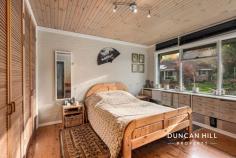 5 Cooke Pl Moss Vale NSW 2577 $1,295,000 Imagine this: A home tucked away at the end of a peaceful cul-de-sac, surrounded by nature - a quiet escape. Picture this: A warm and inviting architecturally designed retreat - every detail made for comfort, style and functionality. Dream of: Cosy evenings by the fireplace and sun-drenched afternoons on the north-facing deck - the feeling of total privacy is all around you. Whether you're entertaining or unwinding, this home is a serene and beautiful place to be. Ready to make it yours? Please get in touch; we look forward to showing you what this property has to offer. Features include: Primary bedroom with ensuite, built-in and walk-in robe Double glazing and triple glazing on fixed windows Kauri pine solid timber flooring and pine ceilings throughout Slow combustion fireplace, gas bayonet, Fujitsu split system cooling Complete under-house storage (previously used as a Teenage retreat and home office) Enclosed rear verandah/sunroom Covered vestibule with double entry Open plan living, dining and kitchen Electric oven and stovetop Fully fenced Partially double brick Designed and built by a local Norwegian craftsman for a Scandinavian family (only one owner) Large, low-maintenance garden